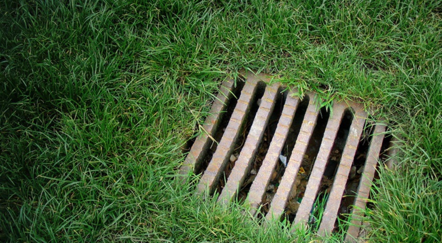 How to Select the Right Drainage Solution for a Sloped or Hilly Yard