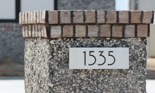 How Weather Influences the Durability of Custom Address Plaques in Montréal